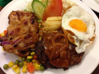 This plate is the current special meal after 15:00 each day; hamburger, chicken, brown onion gravy, egg, French&nbsp;fries, salad, mixed vegetables, rice and soup for just 800 yen