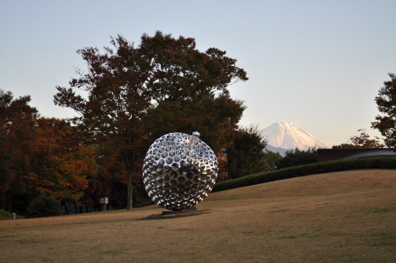<p>A spiky sculpture with Mt. Fuji in the background</p>