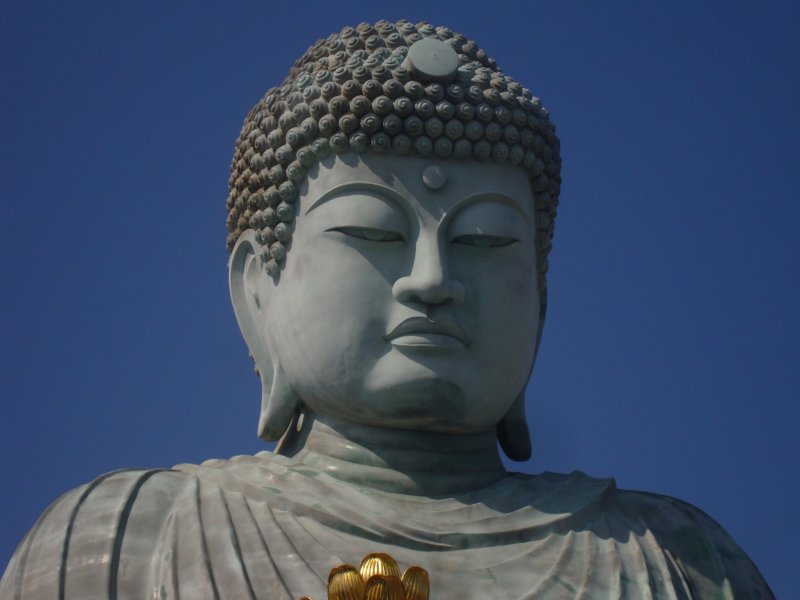 <p>The Nofukuji&nbsp;Temple,&nbsp;which houses the Great Buddha, is located&nbsp;in an unusual suburb, very quiet and virtually no crowds. The idol sits on a lotus flower signifying&nbsp;the most important Sutra of Buddhism, The&nbsp;Lotus Sutra. The Lotus Sutra implies&nbsp;that nothing in world is permanent&nbsp;and the ability for all beings to gain enlightenment.</p>