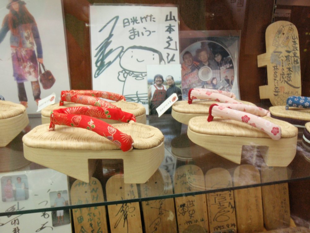 On display are a number of traditional wooden crafts used for shoes and clothing