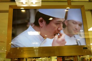 <p>Pastry Chef, Takagi Yasumasa of Le Patissier Takag<strong>i</strong> samples his KitKat creation</p>