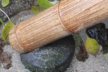<p>Bamboo water spout</p>