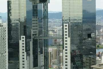 Umeda Sky Building standing tall in the center of Osaka.