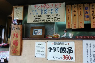 <p>The signs are all in Japanese, and there&#39;s a lot of baseball items and autographs.</p>